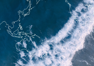 Vue aérienne de l'océan superposée à une carte géographique de l'Indo-Pacifique